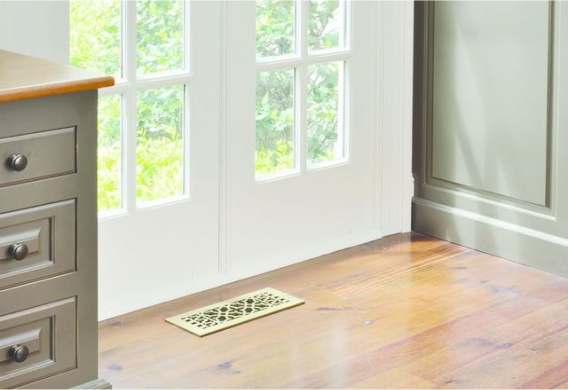 homey picture of floor register with sun shining